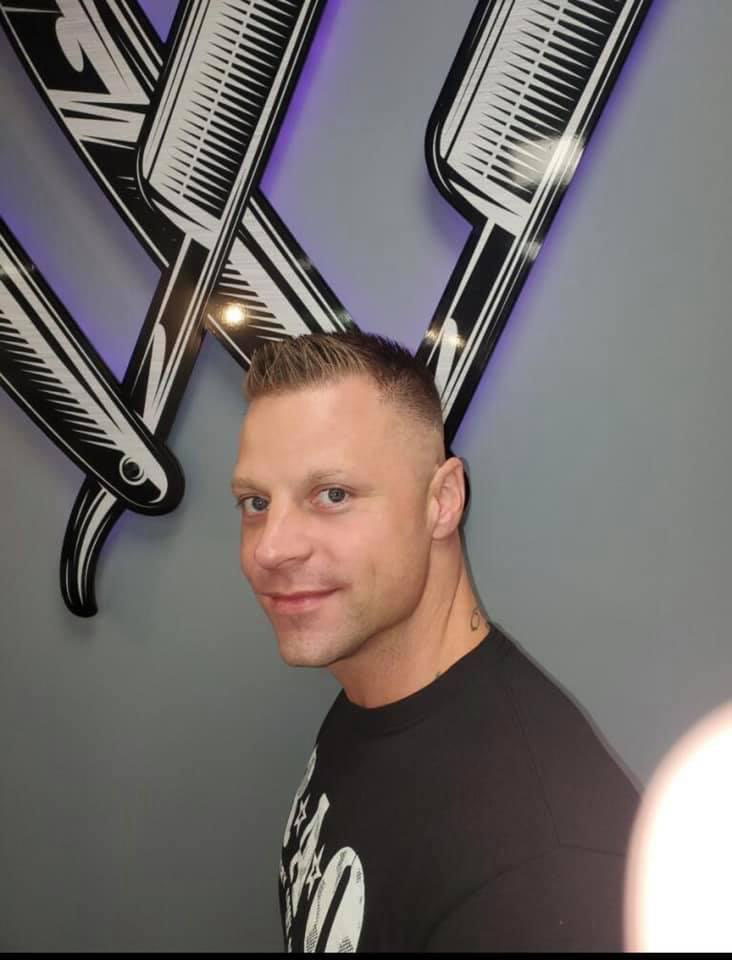 Short spiky crop with high fade at Work of Art Barbershop