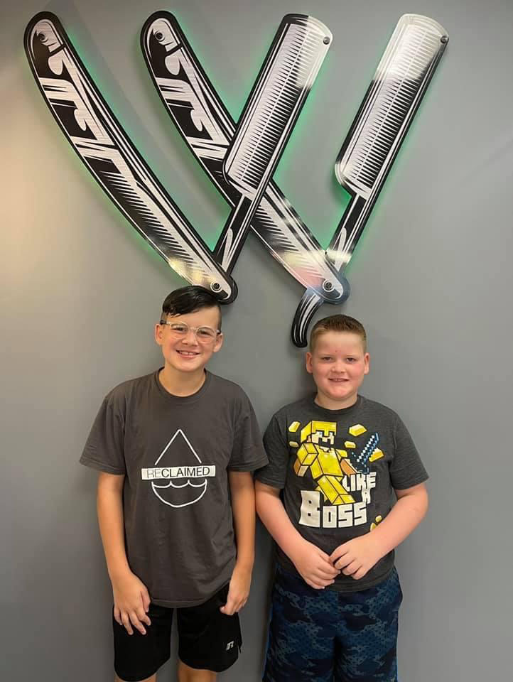 Sharp kids' haircuts at Work of Art Barbershop